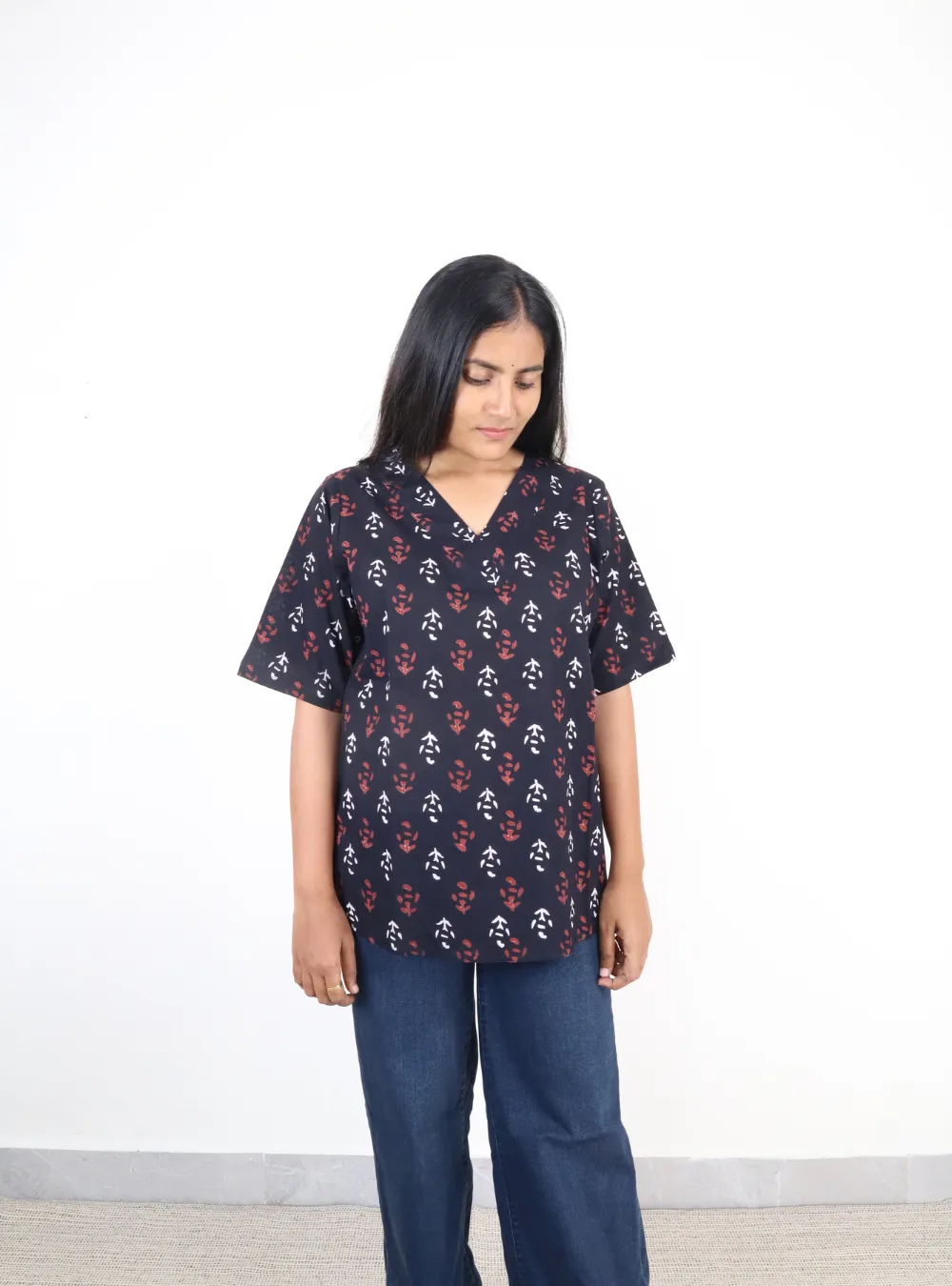 black coloured booti print short kurti