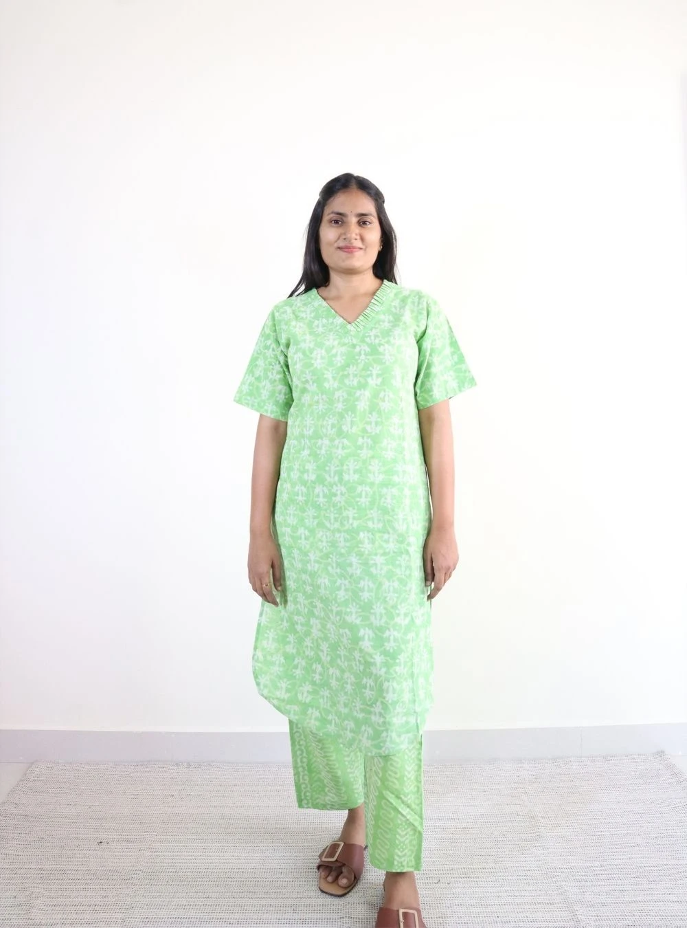 light green coloured dabu print kurta set