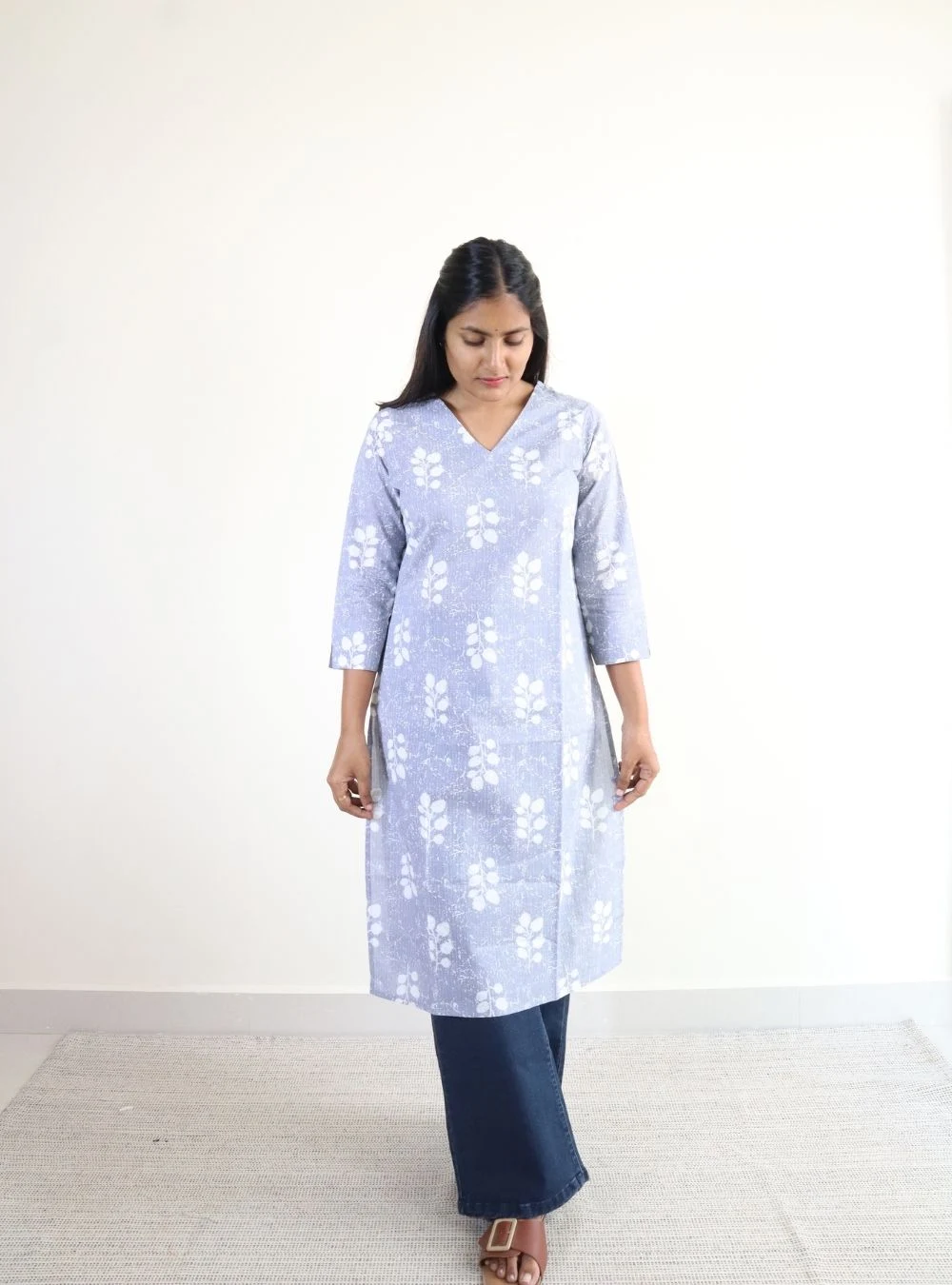 light grey coloured printed cotton kurti