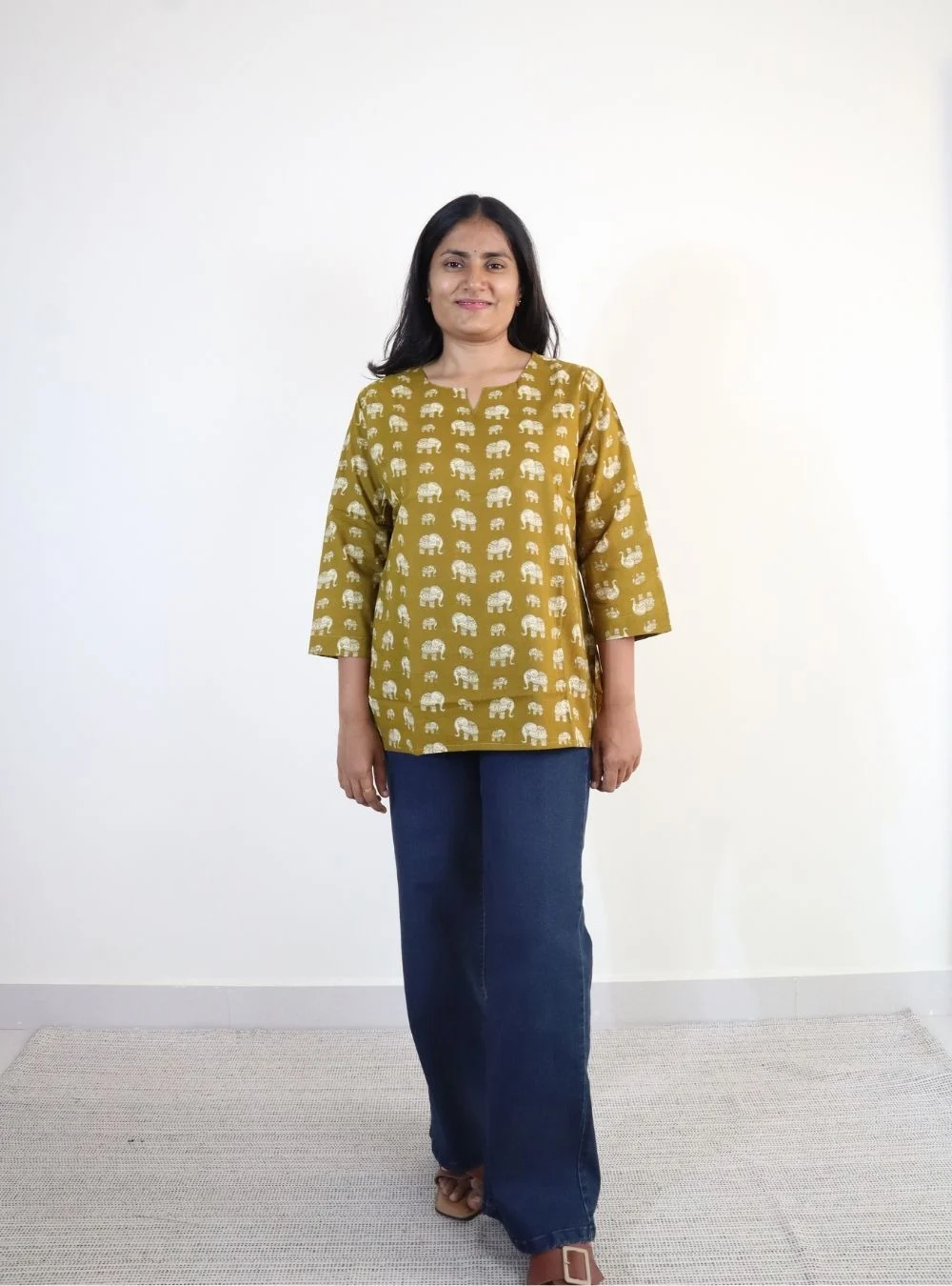 mustard yellow coloured elephant print short kurti