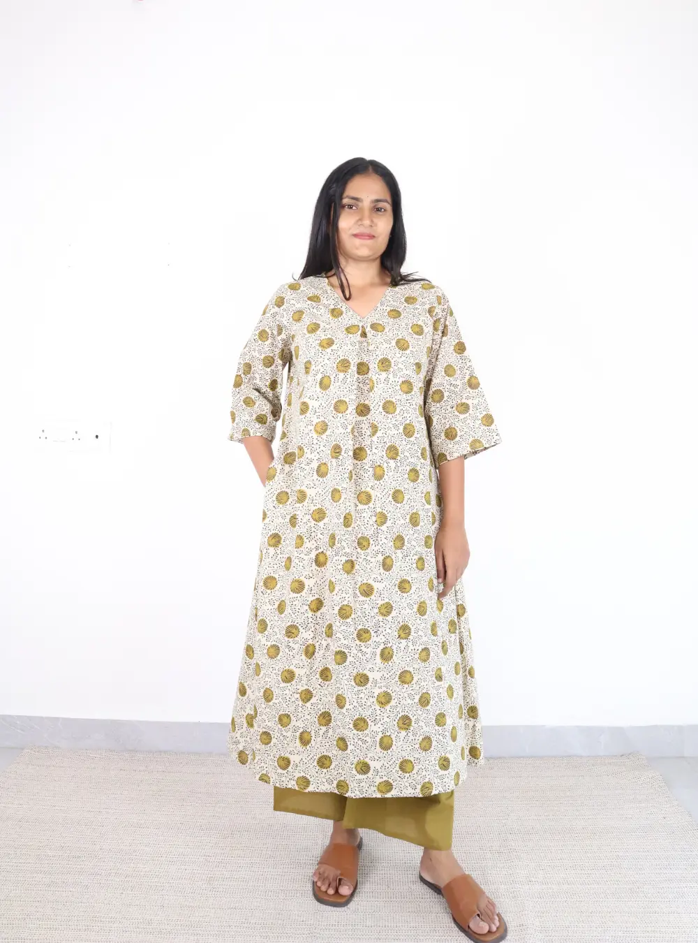 off white coloured printed cotton kurta set