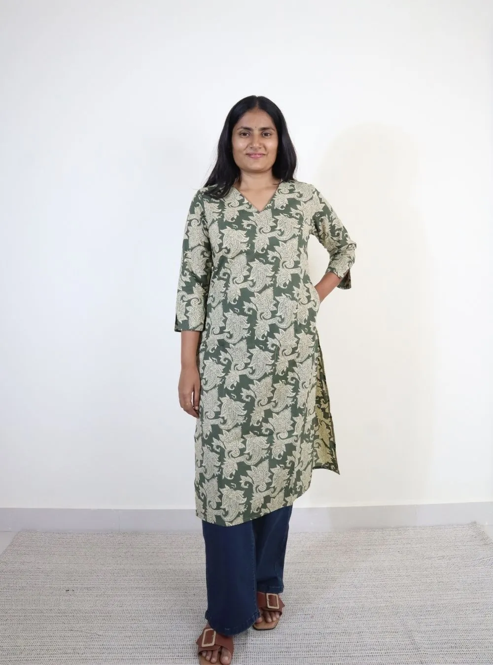 olive green coloured floral print cotton kurti