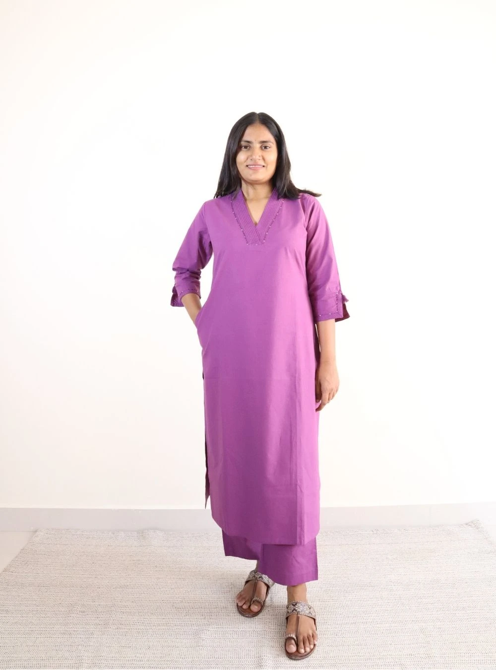 purple coloured solid kurta set